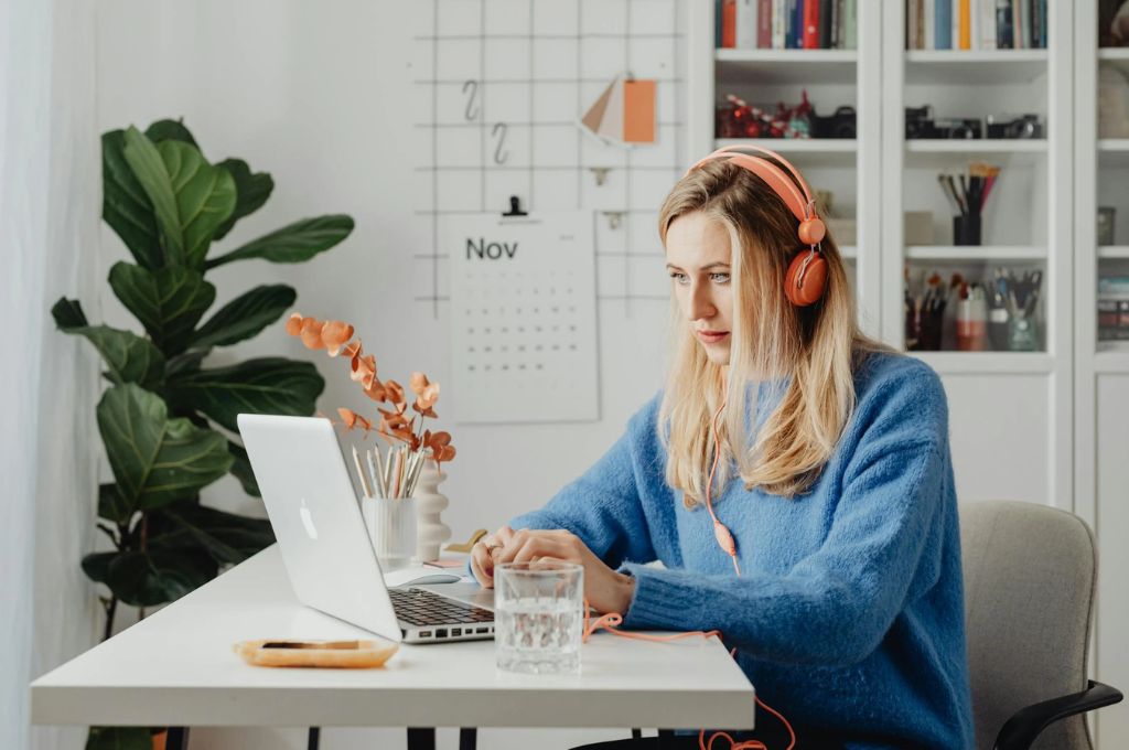 A woman taking a public speaking course as part of her new year's goal ideas