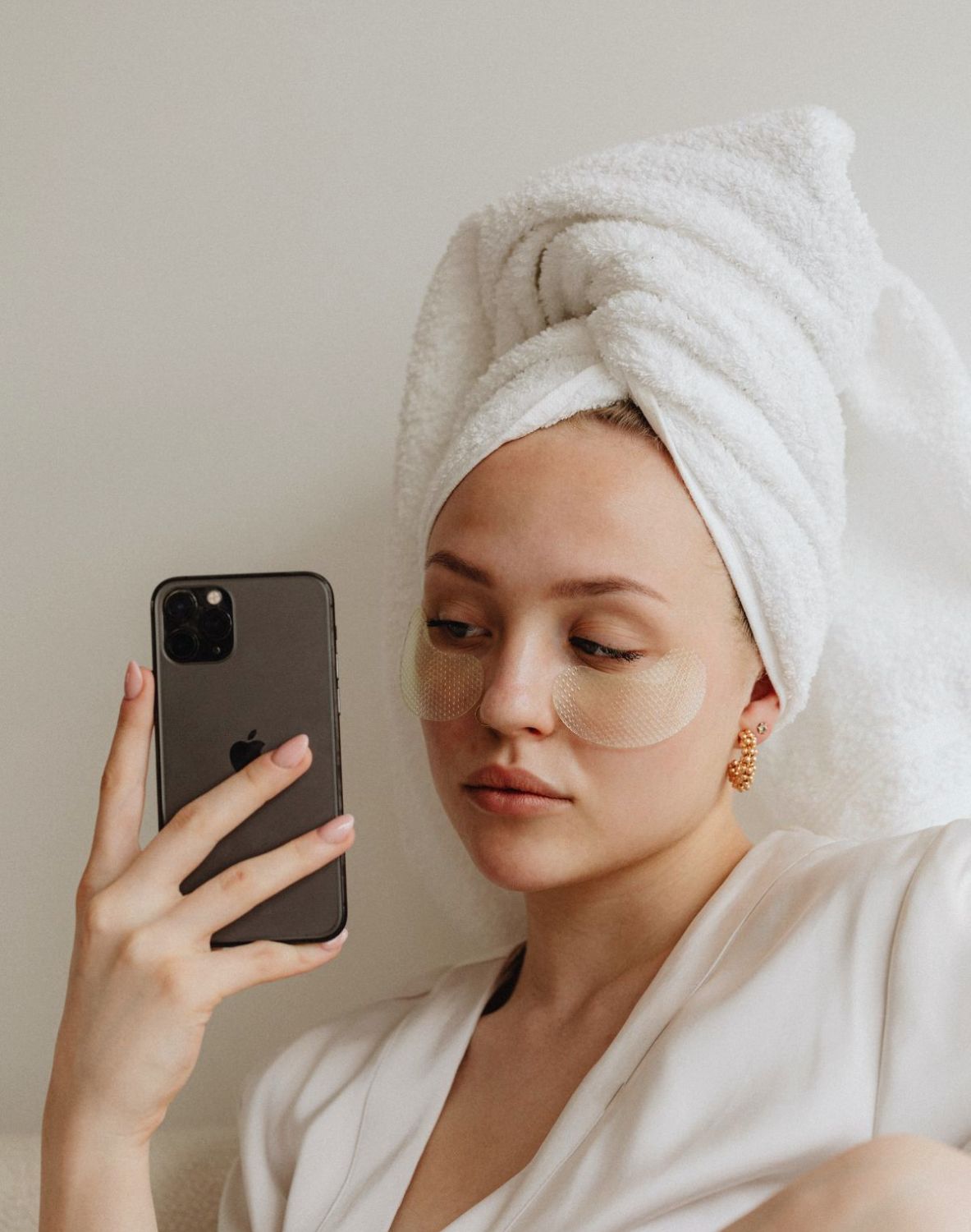 woman wearing eye masks as a glow up tip